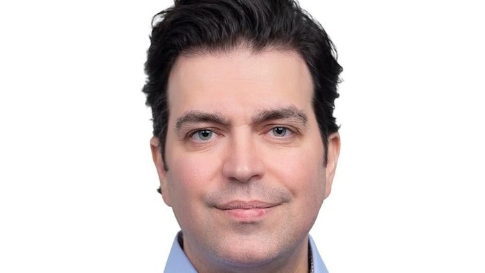 Un portrait de Jim Syrbos