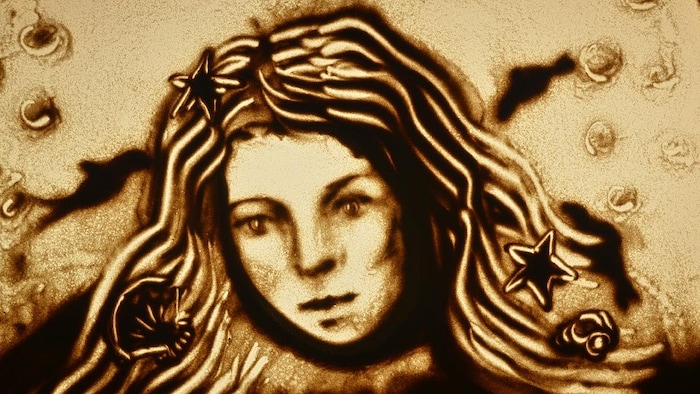 Un dessin en sable.