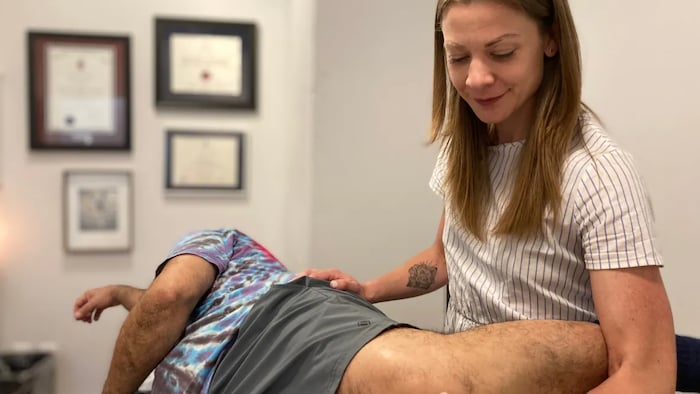 Physiotherapist Lauren Roberts, who founded the Running Physio clinic in Toronto, says the sports medicine field has also been discussing the positive role inflammation may play in healing. (Mark Bochsler/CBC)