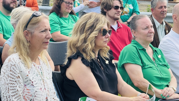People follow carefully. franco-ontarian flag now floating countryside