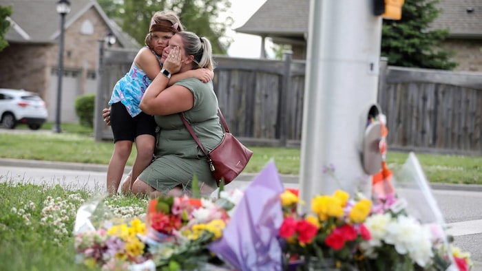 Misty Santerre and her daughter Jasmina were among mourners showing their grief over the fatal attack.