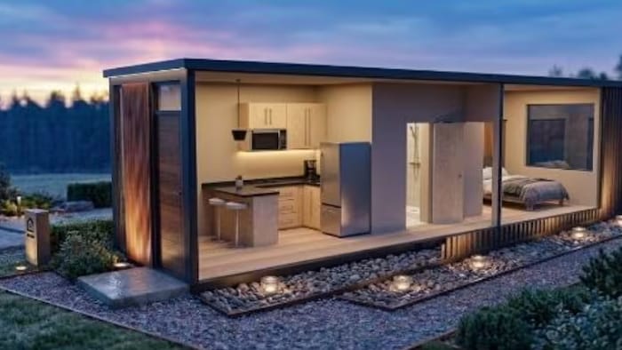 Une illustration conceptuelle de ce à quoi pourrait ressembler un logement sur le toit d'un centre commercial, avec une cusine, salle de bain et une chambre.