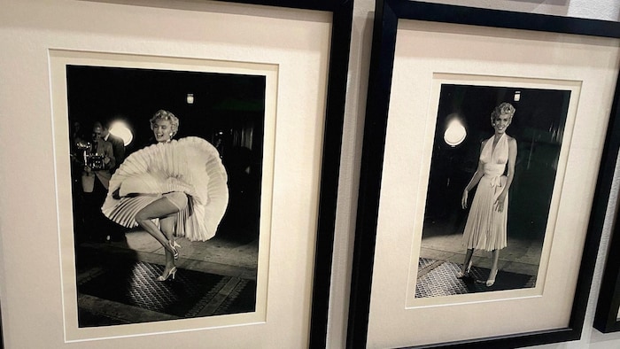 Des photos de Marilyn Monroe accrochées au mur d'un stand au Salon national de l'habitation de Toronto.