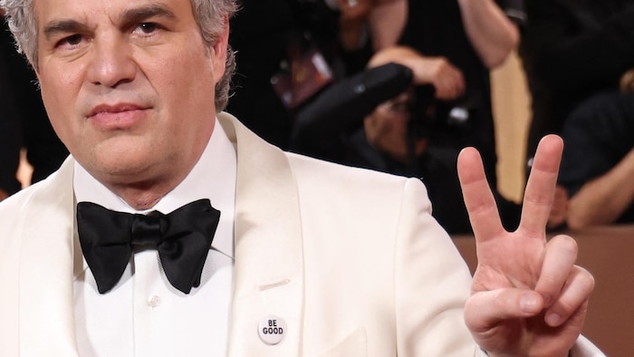 US actor Mark Ruffalo US wears a pin reading "be Good", in tribute to Renee Good, who was fatally shot by a US Immigration and Customs Enforcement (ICE) agent in Minneapolis, as she attends the 83rd annual Golden Globe Awards at the Beverly Hilton hotel in Beverly Hills, California, on January 11, 2026. (Photo by Michael Tran / AFP via Getty Images) / -- IMAGE RESTRICTED TO EDITORIAL USE - STRICTLY NO COMMERCIAL USE --