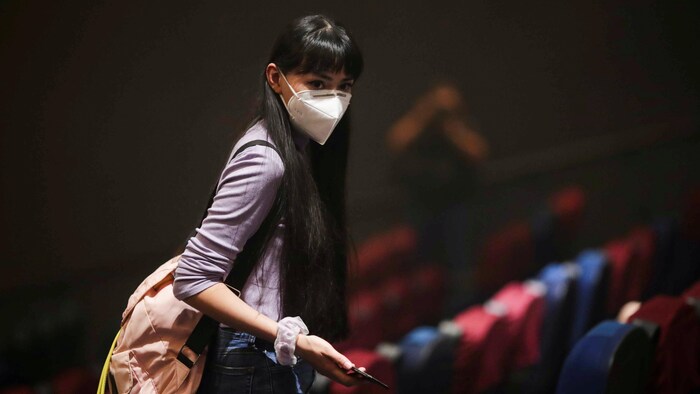 A woman wearing a KN95 mask at a movie theater in Mexico City on March 1, 2021.