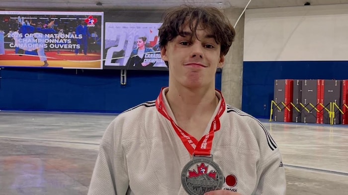 Machiel Talbot et sa médaille.