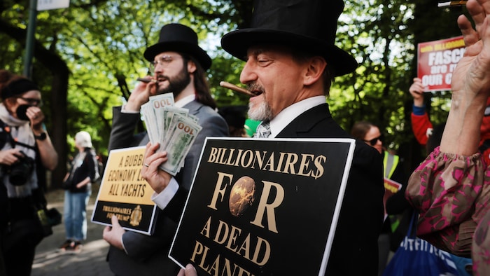 Protesters gather a few blocks from where the Met Gala is being held on May 4, 2026, in New York. 