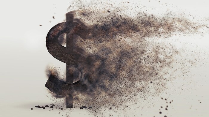 Le symbole du dollar devient poussière.