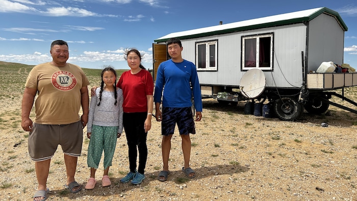 Narki and his family in their camp.