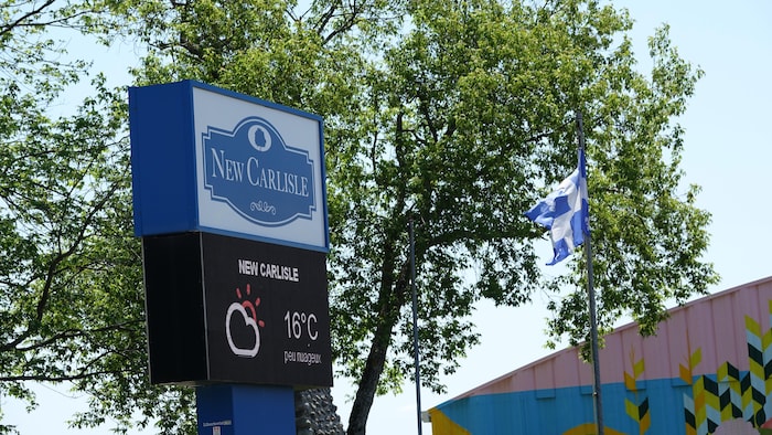 The municipality of New Carlisle, to the left of the Quebec flag.