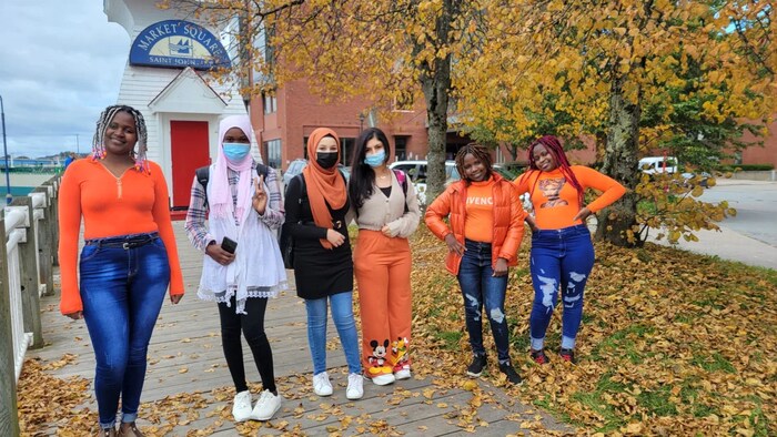 Newcomer students marked the first National Day for Truth and Reconciliation in Saint John as Canadian history is part of their modified curriculum.