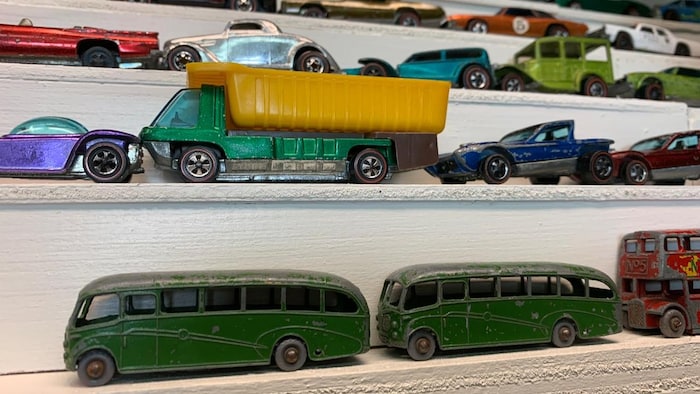Various types of dinkies on shelves.