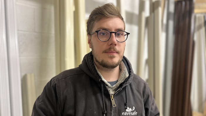 Photo of Nicholas Waldram in a factory.