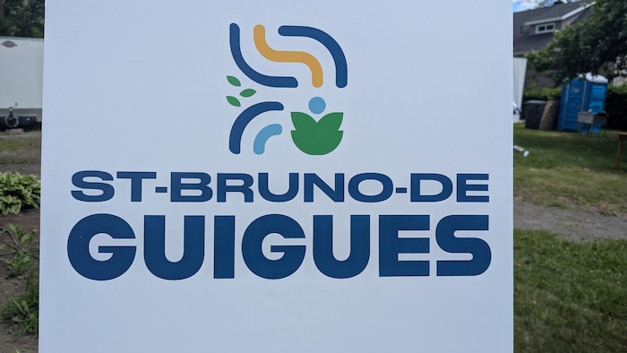 Gros plan sur le nouveau logo, qui contient des lignes qui mènent à une représentation épurée d'une fleur et d'un humain.