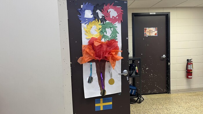 Une porte avec un drapeau de la Suède.