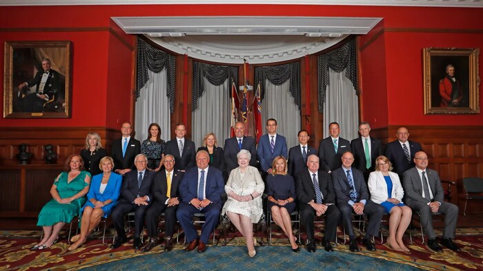 The first cabinet of the Ford government, pictured along with Lieutenant Governor Elizabeth Dowdeswell, front row centre, in June 2018. (Mark Blinch/The Canadian Press)