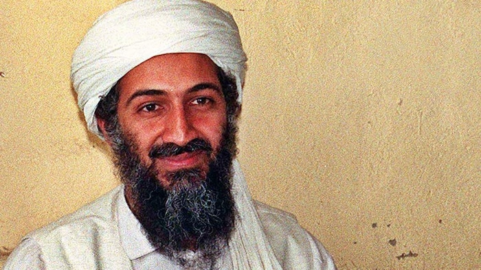 Ben Laden sourit.