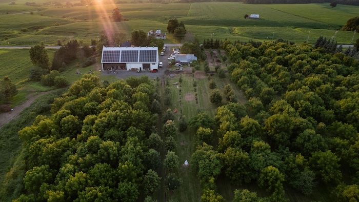 Solar panels on the roof of a farmhouse.