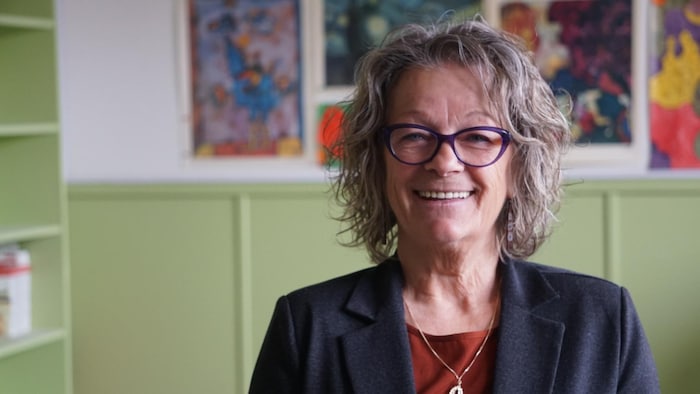 Paquerette Poirier, souriante.