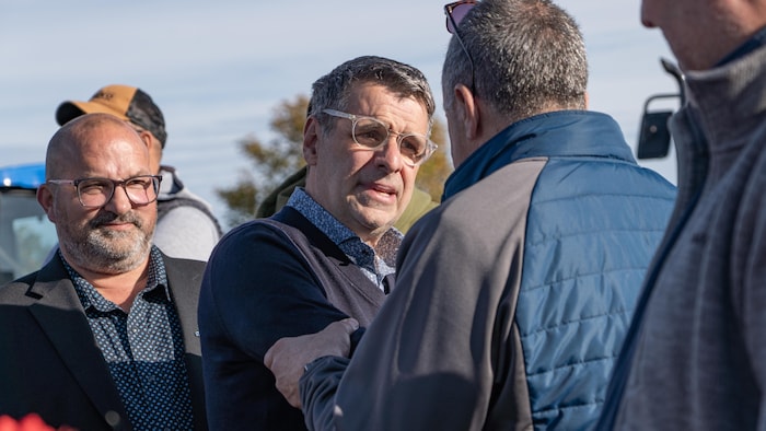 Éric Duhaime et le candidat Frédéric Poulin. 