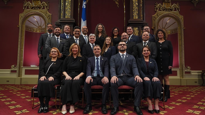 Photo de famille du PCQ lors de la cérémonie d'assermentation.