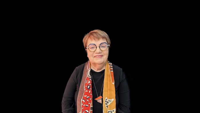 Photo of ex-unionist Claudette Carboneau on black background.