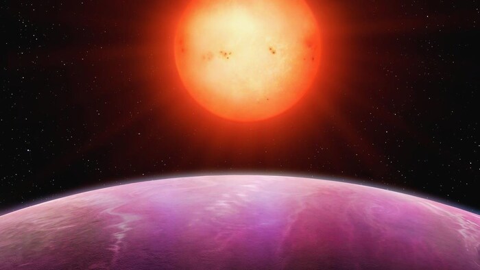 Reconstitution artistique de l'étoile naine NGTS-1 et de la planète en orbite autour d'elle. 