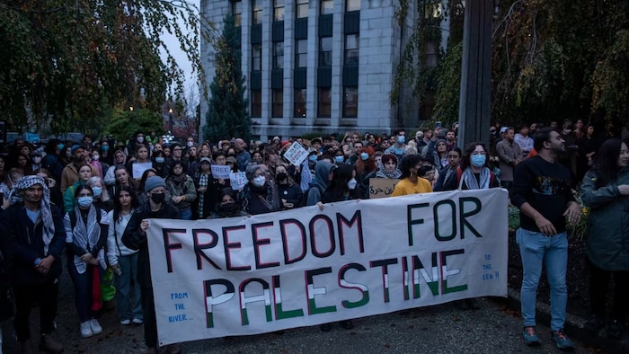 Demonstrators are pictured during a rally for Palestinians at City Hall in Vancouver on Thursday, Oct. 19, 2023. (Ben Nelms/CBC)