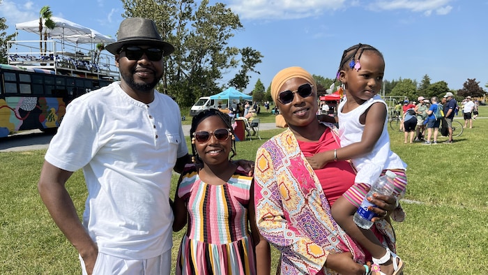 Portrait of Rachida Idrissa with her spouse and their two children. gathering family national holiday rimouski gathering family national holiday rimouski new