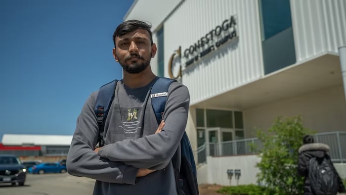 Conestoga College student Rahish Jariya says he can't find rental housing within his budget. He's pictured in Waterloo, Ont., on May 26. (Yanjun Li/CBC)