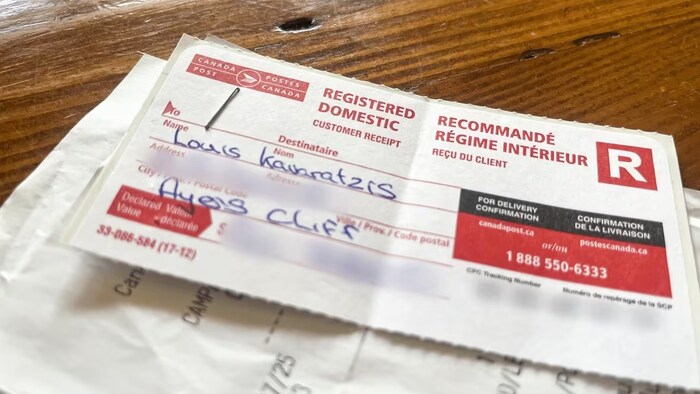 The Canada Post registered mail receipt George received after sending the certified cheque. CBC News blurred out personal information on the receipt. (Angelina King/CBC)