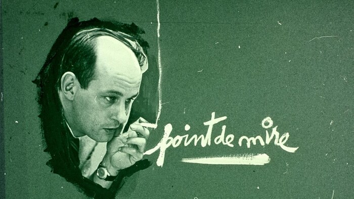 Image d'ouverture de l'émission avec une photo de la tête de l'animateur qui fume, et le titre « Point de mire » écrit à la craie