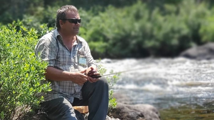 A man fishery seated.