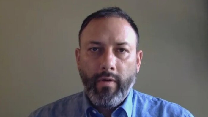 Santiago Escobar, national representative for the United Food and Commercial Workers Union Canada, says it can be complicated and overwhelming for migrant workers to be charged criminally in something they thought was legal. (Jason Viau/CBC)