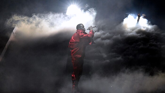 Sean Combs in a cloud of smoke.