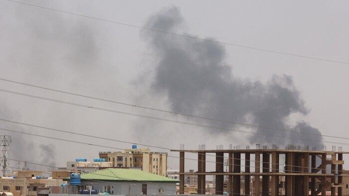 Plumes of smoke can be seen on the horizon in an area east of Khartoum, Sudan's capital, on Friday as fighting continues between the country's army and paramilitary forces. 