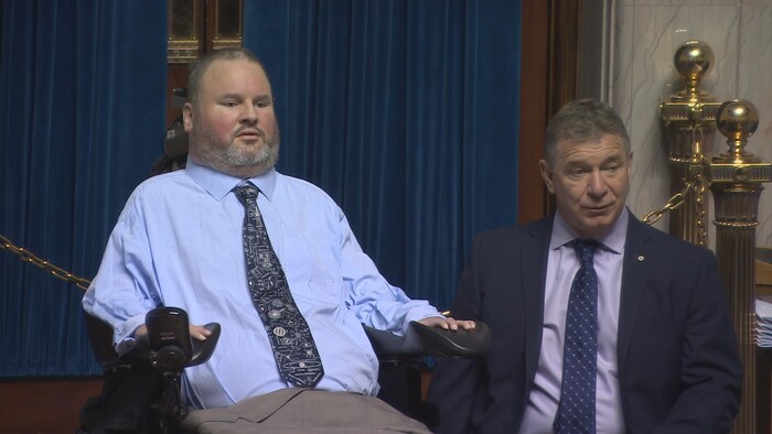 Steven Fletcher (gauche) et Rick Hansen (droite).
