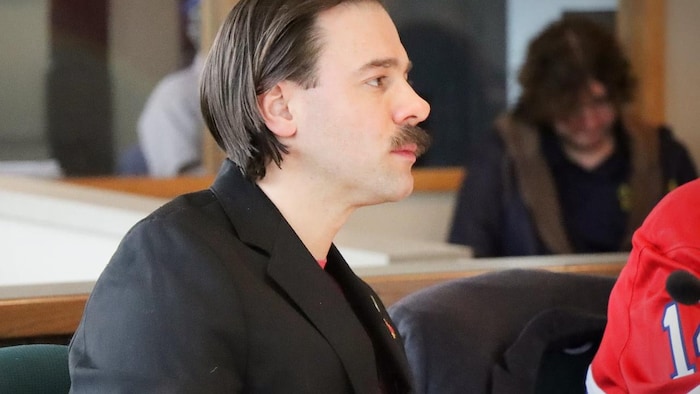 Le conseiller lors d'une réunion.