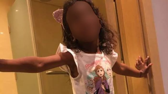 A blurred photo of the woman's four-year old daughter.