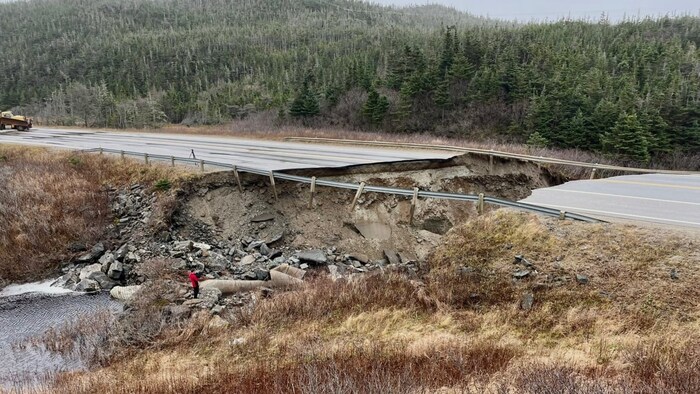 A section of highway east of Port aux Basques is completely wiped out.