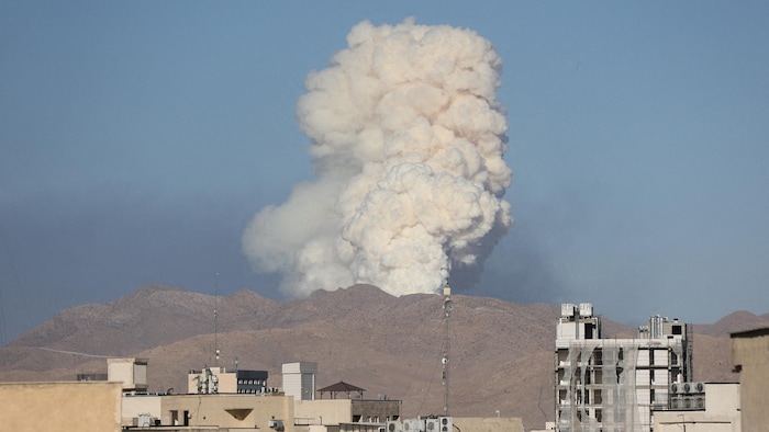 A large cloud of smoke in the distance.