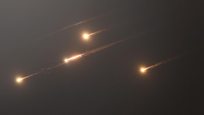 Luminous streaks in the sky of Jerusalem. nato 2025 summit: avoid chicane nato 2025 summit: avoid chicane new