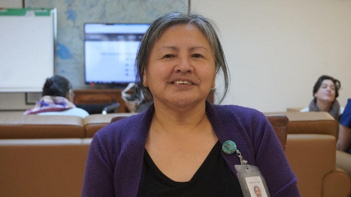 Julia Niedzo looks into the camera, October 2024, in Bahchouk, Northwest Territories.