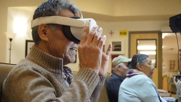 Person wearing a virtual reality headset, October 2024, Northwest Territories.