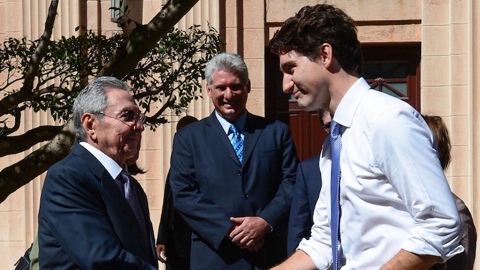 A beaming Miguel Diaz-Canel looks on as Prime Minister Justin Trudeau shakes hands with Raul Castro in Havana on Nov. 16, 2016. Castro introduced Trudeau to the man who would replace him as president two years later.