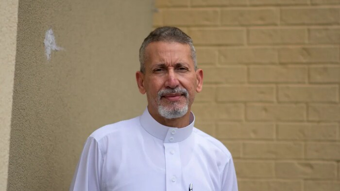 Imam Kamal Gurgi stood outside of the Hamilton Downtown Mosque days after police say someone threatened to kill his wife and daughter.