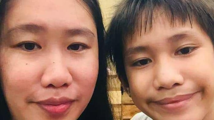 Dizon is pictured with her son Raven, 15. She's currently working two jobs so they can move to Canada. (Submitted by Mary Joy Dizon)