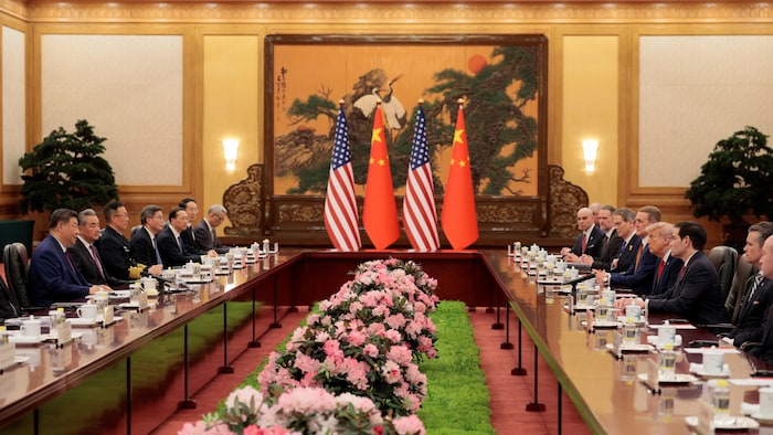Le président américain Donald Trump participe à une réunion bilatérale élargie avec le président chinois Xi Jinping à Pékin, le 14 mai 2026.