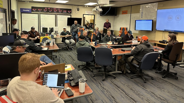 People gathered in the meeting room.