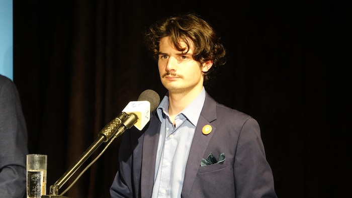 Zachary Jean lors du débat de CFIM en 2026.